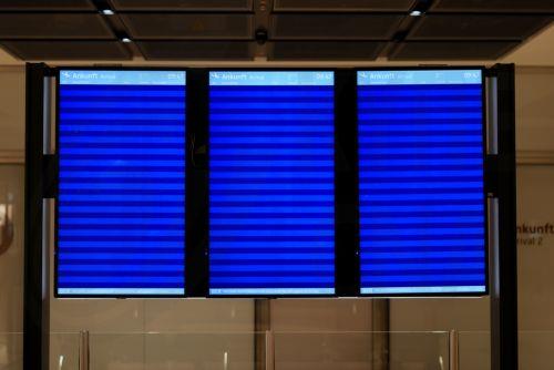 epa12829313 Empty arrival boards are seen at Berlin Brandenburg Airport in Schoenefeld, Germany, 18 March 2026. Passenger flight operations were completely suspended due to a one-day warning strike by the Verdi union. According to the airport operator, the strike affects 445 departures and arrivals and around 57,000 passengers. Verdi is currently...