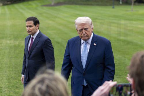 epa12837381 US President Donald J. Trump (R), with Secretary of State Marco Rubio (L), responds to a question from the news media as he walks to board Marine One on the South Lawn of the White House in Washington, DC, USA, 20 March 2026.  EPA/SHAWN THEW / POOL