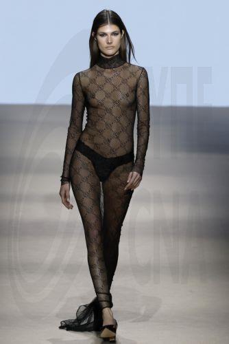 epa12838237 A model takes to the catwalk with designs of Angel Schlesser during the Mercedes-Benz Fashion Week Madrid (MBFWMadrid), in Madrid, Spain, 21 March 2026.  EPA/J.J.Guillen