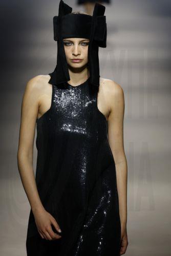 epa12838241 A model takes to the catwalk with designs of Angel Schlesser during the Mercedes-Benz Fashion Week Madrid (MBFWMadrid), in Madrid, Spain, 21 March 2026.  EPA/J.J.Guillen