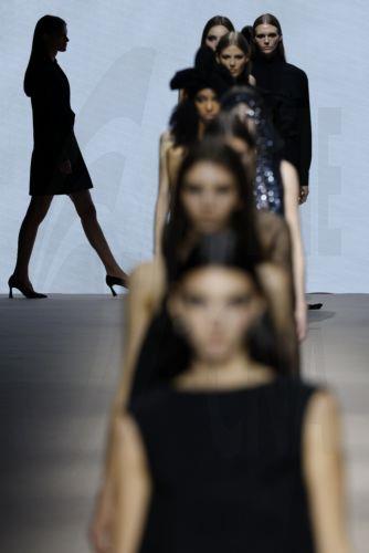 epa12838242 Models take to the catwalk with designs of Angel Schlesser during the Mercedes-Benz Fashion Week Madrid (MBFWMadrid), in Madrid, Spain, 21 March 2026.  EPA/J.J.Guillen