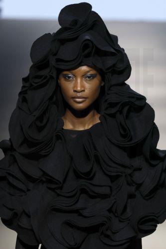 epa12838246 A model takes to the catwalk with designs of Angel Schlesser during the Mercedes-Benz Fashion Week Madrid (MBFWMadrid), in Madrid, Spain, 21 March 2026.  EPA/J.J.Guillen