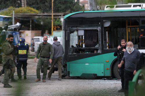 epa12843886 Israeli security, rescue, and paramedics at the scene of a direct hit by a missile fired by Hezbollah in the northern  Israeli city of Kiryat Shmona, 23 March 2026. The Israeli military stated it is conducting strikes across Lebanon targeting Hezbollah infrastructure and personnel.  EPA/ATEF SAFADI