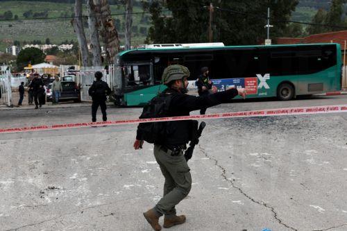 epa12843890 Israeli security, rescue, and paramedics at the scene of a direct hit by a missile fired by Hezbollah in the northern  Israeli city of Kiryat Shmona, 23 March 2026. The Israeli military stated it is conducting strikes across Lebanon targeting Hezbollah infrastructure and personnel.  EPA/ATEF SAFADI