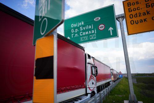 epa12844275 Truck drivers take part in the blockade of the Svilaj border crossing between Bosnia and Herzegovina and Croatia near Donji Svilaj, Bosnia and Herzegovina, 23 March 2026. All border crossings in the country are blocked to freight traffic as carriers suspend transit toward the European Union in opposition to the EU’s Entry/Exit System (EES),...