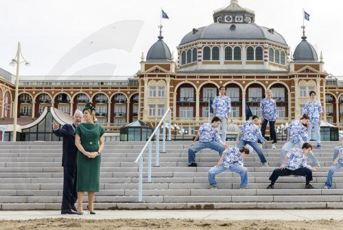 epa12866070 Dutch Queen Maxima (2-L) and The Hague Mayor Jan van Zanen (L) unveil a new staircase as dancers perform in front of the Grand Hotel Kurhaus during the official reopening of the renovated Scheveningen boulevard, in The Hague, The Netherlands, 02 April 2026. The renovated boulevard is wider and greener, designed for better climate resilience and...