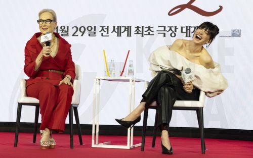 epa12874411 US actor Meryl Streep (L) speaks as Anne Hathaway (R) reacts during a press conference for the film, 'The Devil Wears Prada 2' in Seoul, South Korea, 08 April 2026. The film opens worldwide on 29 April 2026.  EPA/JEON HEON-KYUN