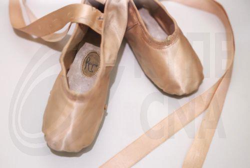 epa12877248 Ballet shoes are displayed at the exhibition 'Queen Elizabeth II: Her Life in Style' at The King’s Gallery, Buckingham Palace in London, Britain, 09 April 2026. The exhibition features 300 pieces of clothing and accessories worn by late Britain’s Queen Elizabeth and runs from 10 April to 18 October 2026.  EPA/NEIL HALL