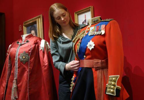 epa12877254 Ceremonial tunics of Britain’s Queen Elizabeth II is displayed at the exhibition 'Queen Elizabeth II: Her Life in Style' at The King’s Gallery, Buckingham Palace in London, Britain, 09 April 2026. The exhibition features 300 pieces of clothing and accessories worn by late Britain’s Queen Elizabeth and runs from 10 April to 18 October 2026. ...