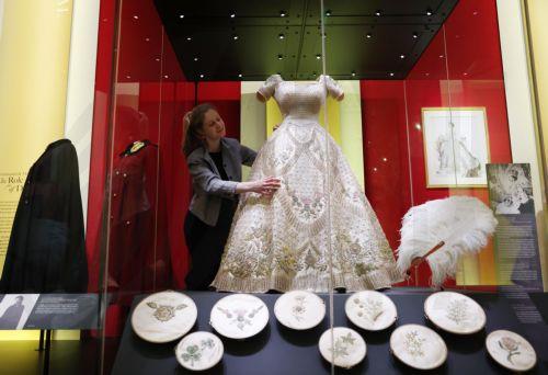 epa12877270 The coronation dress of Britain’s Queen Elizabeth II worn in 1953 is displayed at the exhibition 'Queen Elizabeth II: Her Life in Style' at The King’s Gallery, Buckingham Palace in London, Britain, 09 April 2026. The exhibition features 300 pieces of clothing and accessories worn by late Britain’s Queen Elizabeth and runs from 10 April to 18...