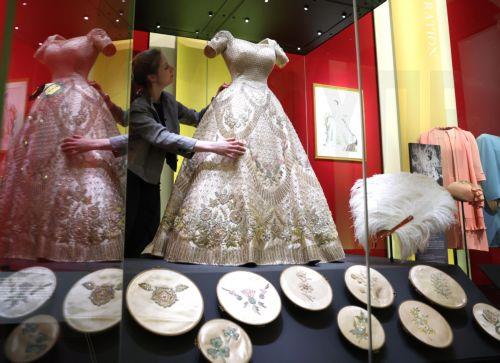 epa12877275 The coronation dress of Britain’s Queen Elizabeth II worn in 1953 is displayed at the exhibition 'Queen Elizabeth II: Her Life in Style' at The King’s Gallery, Buckingham Palace in London, Britain, 09 April 2026. The exhibition features 300 pieces of clothing and accessories worn by late Britain’s Queen Elizabeth and runs from 10 April to 18...