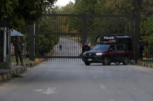 epa12877626 A police vehicle is stationed on a deserted road leading to the red zone where most of the diplomatic missions and government offices are situated, as this zone is blocked for security ahead of the visit of US and Iranian delegations in Islamabad, Pakistan, 09 April 2026. Prime Minister Shehbaz Sharif said US and Iranian delegations will visit...