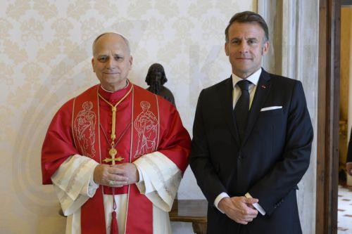 epa12880006 A handout picture provided by the Vatican Media shows Pope Leo XIV (L) and French President Emmanuel Macron during a private audience in Vatican City, 10 April 2026.  EPA/VATICAN MEDIA HANDOUT HANDOUT EDITORIAL USE ONLY/NO SALES