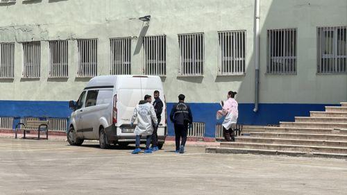 epa12888874 Turkish police investigators work at the site of a shooting that took place in a school in Siverek district of Sanliurfa, Turkey, 14 April 2026. At least 16 people have been injured after a former student opened fire at the Ahmet Koyuncu Vocational and Technical Anatolian High School in Siverek district, before killing himself with the same...