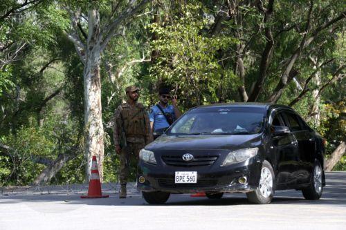 epa12902499 Pakistani security officials guard a road ahead of the expected arrival of a US delegation in Islamabad, Pakistan, 20 April 2026. As the ceasefire deadline nears, US negotiators are returning to Islamabad for a second round of talks, despite an Iranian Foreign Ministry spokesperson stating that Tehran has no plans to participate.  EPA/SOHAIL...