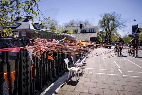 epa12907188 Spots are reserved for a flea market in Amsterdam, the Netherlands, 22 April 2026, as the city prepares for King's Day. In 2026, the Netherlands will celebrate King's Day on 27 April.  EPA/ROBIN VAN LONKHUIJSEN
