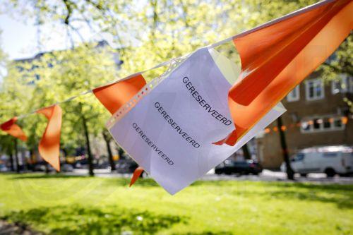 epa12907190 Spots are reserved for a flea market in Amsterdam, the Netherlands, 22 April 2026, as the city prepares for King's Day. In 2026, the Netherlands will celebrate King's Day on 27 April.  EPA/ROBIN VAN LONKHUIJSEN