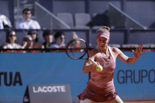epa12907284 Austria's Sinja Kraus in action during her women's singles first-round match against Czech Republic's Karolina Pliskova at the Madrid Open tennis tournament in Madrid, Spain, 22 April 2026.  EPA/JUANJO MARTIN