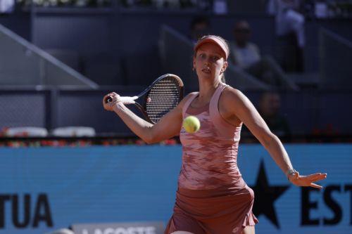 epa12907287 Austria's Sinja Kraus in action during her women's singles first-round match against Czech Republic's Karolina Pliskova at the Madrid Open tennis tournament in Madrid, Spain, 22 April 2026.  EPA/JUANJO MARTIN