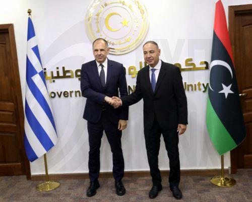 epa12917048 Libya's acting Foreign Minister Taher Al-Baour (R) shakes hands with Greek Foreign Minister George Gerapetritis (L) during their meeting in Tripoli, Libya, 27 April 2026.  EPA/STRINGER