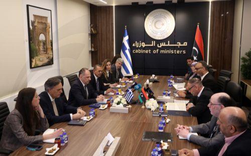 epa12917052 Libya's acting Foreign Minister Taher Al-Baour (3-R) meets with Greek Foreign Minister George Gerapetritis (3-L) in Tripoli, Libya, 27 April 2026.  EPA/STRINGER