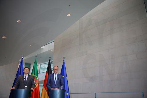 epa12934645 German Chancellor Friedrich Merz (R) speaks next to Portuguese Prime Minister Luis Montenegro during a press conference at the Chancellery in Berlin, Germany, 05 May 2026. German Chancellor Friedrich Merz and Portuguese Prime Minister Luis Montenegro met for talks.  EPA/CLEMENS BILAN