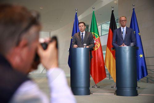 epa12934648 Portuguese Prime Minister Luis Montenegro (L) speaks next to German Chancellor Friedrich Merz during a press conference at the Chancellery in Berlin, Germany, 05 May 2026. German Chancellor Friedrich Merz and Portuguese Prime Minister Luis Montenegro met for talks.  EPA/CLEMENS BILAN