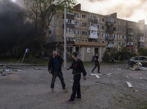 epa12934997 A handout photo made available by the press service of the 93rd Kholodnyi Yar Separate Mechanized Brigade of Ukrainian Armed Forces shows peole walking on a street among debris in the aftermath of a Russian airstrike in Kramatorsk, Donetsk region, Ukraine, 05 May 2026, amid the ongoing Russian invasion. Several people died and a dozens were...