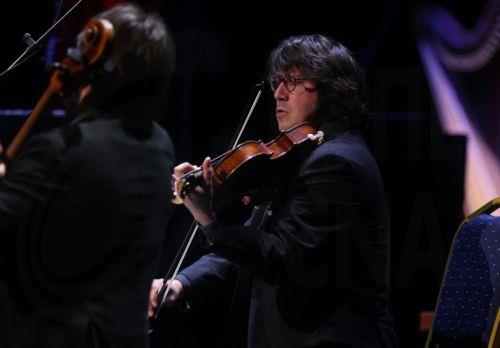 epa12935038 A member of the Spanish Gerhard Quartet Jesus Sebastia Miralles performs during the 15th International Cultural Festival of Symphonic Music at the Algiers Opera in Algiers, Algeria, 5 May 2026. The festival runs from 30 April to 7 May and features 21 participating countries with the Czech Republic serving as the guest of honor.  EPA/MOHAMED...
