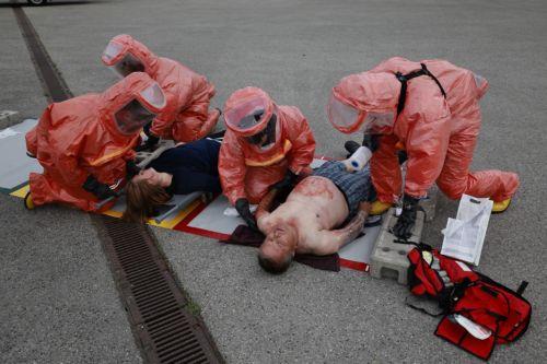 epa12947898 Members of the Bavarian Red Cross and role players participate in an exercise demonstrating the organization’s complex emergency response system in Munich, Germany, 11 May 2026. The drill involved more than 75 emergency responders and role players and simulated a mass casualty incident caused by a crowd accident and the leak of an initially...