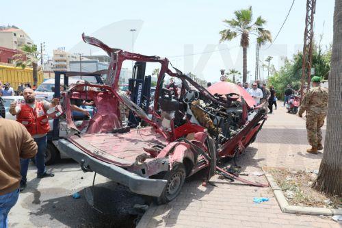 epa12952889 Lebanese rescuers and army soldiers inspect the wreckage of a vehicle that was hit in an Israeli strike in the southern coastal city of Sidon, Lebanon, 13 May 2026.  EPA/WAEL HAMZEH