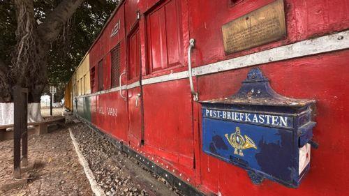 epa12958421 A historic railway letter box on a bogie is displayed at Golra Railway Station in Islamabad, Pakistan, 14 May 2026. According to its inscription, the letter box was taken from a railway station on the Tanga-Moschi line in German East Africa and presented to the Lahore Post Office by Major General Sir H. E. Watson in 1916 in recognition of...