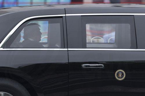 epa12958726 US President Donald Trump travels in his car while the motorcade rides along a street in Beijing, China, 15 May 2026. US President Donald Trump pays a state visit to China from 13 to 15 May.  EPA/ANDRES MARTINEZ CASARES