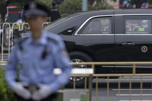 epa12958729 US President Donald Trump travels in his car while the motorcade rides along a street in Beijing, China, 15 May 2026. US President Donald Trump pays a state visit to China from 13 to 15 May.  EPA/ANDRES MARTINEZ CASARES