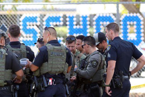epa12972653 Law enforcement personnel gather on the scene to respond to an active shooting incident at the Islamic Center of San Diego, located in the Clairemont neighborhood in San Diego, California, USA, 18 May 2026.  Police agencies from across San Diego County responded to an active shooter incident at the Islamic Center of San Diego in the Clairemont...