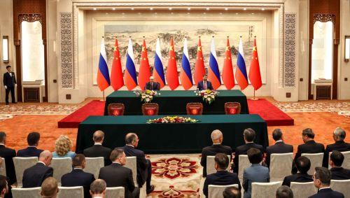epa12977163 Russian President Vladimir Putin (L) and Chinese President Xi Jinping attend a signing ceremony at the Great Hall of the People in Beijing, China, 20 May 2026.  EPA/ALEXANDER KAZAKOV/KREMLIN / POOL MANDATORY CREDIT
