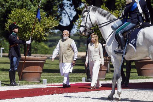 epa12977234 Italian Prime Minister Giorgia Meloni (R) welcomes Indian Prime Minister Narendra Modi prior to a meeting at Villa Pamphili in Rome, Italy, 20 May 2026.  EPA/ANGELO CARCONI