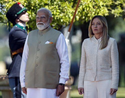 epa12977236 Italian Prime Minister Giorgia Meloni (R) welcomes Indian Prime Minister Narendra Modi prior to a meeting at Villa Pamphili in Rome, Italy, 20 May 2026.  EPA/ANGELO CARCONI