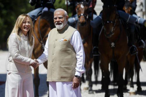epa12977240 Italian Prime Minister Giorgia Meloni (L) welcomes Indian Prime Minister Narendra Modi prior to a meeting at Villa Pamphili in Rome, Italy, 20 May 2026.  EPA/ANGELO CARCONI