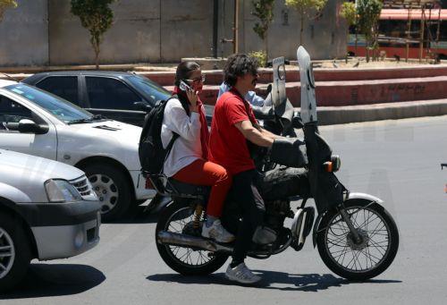 epa12992436 Iranians drive in a street in Tehran, Iran, 25 May 2026. The US and Iran voiced optimism regarding a potential peace agreement and the reopening of the Strait of Hormuz, though both sides emphasized that no such deal has been reached yet.  EPA/ABEDIN TAHERKENAREH