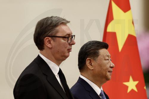 epa12992708 Chinese President Xi Jinping (R) and Serbian President Aleksandar Vucic attend a welcoming ceremony at the Great Hall of the People in Beijing, China, 25 May 2026.  EPA/TINGSHU WANG / POOL