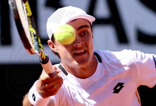 epa12994451 Adam Walton of Australia hits a forehand during his Men's 1st round match against Daniil Medvedev of Russia at the French Open Grand Slam tennis tournament at Roland Garros in Paris, France, 26 May 2026.  EPA/CHRISTOPHE PETIT TESSON