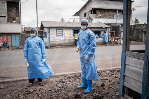 epa12997441 Health workers in protective gowns and masks operate at a checkpoint set up for preventive measures against Ebola in Kanyaruchinya, near Goma, North Kivu, Democratic Republic of Congo, 27 May 2026. The World Health Organization (WHO) has declared the Ebola outbreak, caused by the Bundibugyo virus, in the Democratic Republic of the Congo a public...