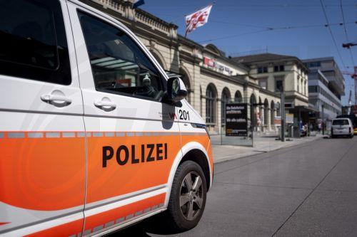 epa12999755 A police car parked outside the railway station in Winterthur, Switzerland, 28 May 2026. According to the Zurich regional police, a 31-year-old Swiss national stabbed and injured three people at the station. The suspected perpetrator was arrested on-site, and the victims were taken to the hospital. The motive for the attack remains under...