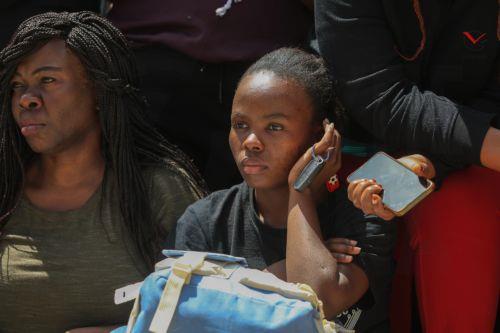 epa12999941 Students and parents gather at Utumishi Girls Academy following a deadly fire in Nakuru, 120 kilometers northwest of Nairobi, Kenya, 28 May 2026. At least 16 students were killed in a fire in the school dormitory overnight, according to police and government officials.  EPA/STRINGER
