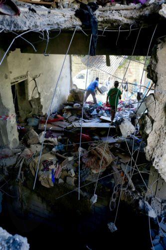 epa12999968 People inspect the damage inside a building following an Israeli airstrike in the southern coastal city of Sidon, Lebanon, 28 May 2026. At least four people were killed and several others injured in the attack. On 27 May, Israel had designated all regions south of the Zahrani River in Lebanon, roughly 40km from the border, including Tyre, as...