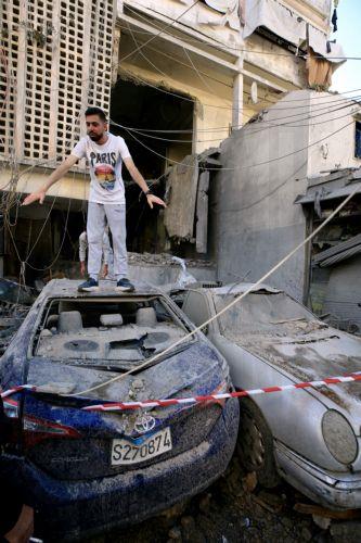 epa12999971 A man inspects the site following an Israeli airstrike in the southern coastal city of Sidon, Lebanon, 28 May 2026. At least four people were killed and several others injured in the attack. On 27 May, Israel had designated all regions south of the Zahrani River in Lebanon, roughly 40km from the border, including Tyre, as 'combat zones' and...