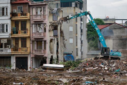 epa13017062 A man works at a demolition site in Hanoi, Vietnam, 05 June 2026. World Environment Day is celebrated globally every year on 05 June and aims to bring awareness to environmental issues. The theme for 2026 is ‘Inspired by Nature. For Climate. For Our Future’.  EPA/LUONG THAI LINH