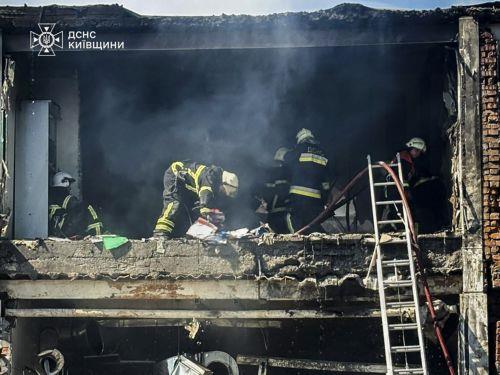 epa13017293 A handout photo made available by the State Emergency Service shows Ukrainian rescuers working at the site of a Russian strike on a food industry enterprise in Kyiv's area, Ukraine, 05 June 2026, amid the ongoing Russian invasion. At least four people were killed and four others were injured in an overnight Russian attack on the food industry...