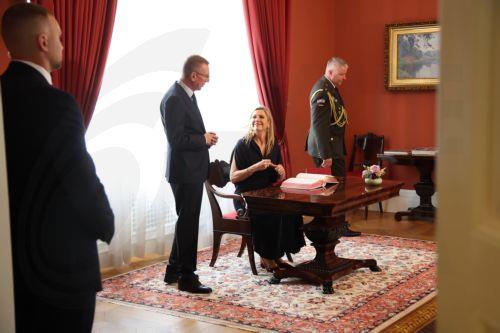 epa13017679 Latvian President Edgars Rinkevics (C) looks on as Netherlands' Queen Maxima (R) signs the guest book during their meeting in Riga, Latvia, 05 June 2026. Later Queen Maxima, the United Nations Secretary-General’s Special Advocate for Financial Health (UNSGSA), will be speaking at the opening of the 35th Annual Meeting of the Board of Governors...